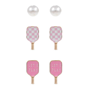 Pink 3PCS Enamel Pickle Ball Paddle Pearl Stud Earring Set. Crafted with delicate pearls and bold enamel accents, these earrings are a symbol of elegance and sophistication. Perfect for any occasion, these stud earrings will add a touch of luxury to your look.