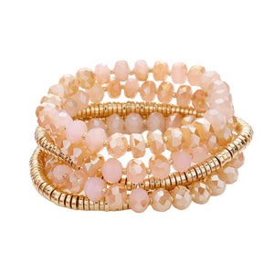 Pink 5PCs Faceted & Heishi Beaded Multi Layered Stretch Bracelet, is crafted with a combination of faceted and heishi beads for a unique look. The stretchable design fits most wrists, making it perfect for special occasion. The multi-layered design adds a stunning look that will be sure to turn heads.