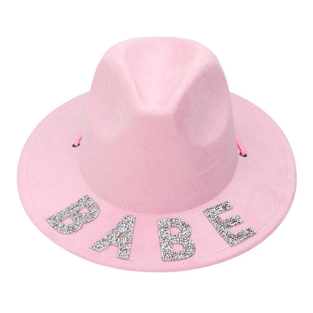 Pink Bling BABE Message Pointed Western Cowboy Hat is a statement piece for any fashion-forward individual. The bold message and pointed design add a touch of attitude to any outfit. Made with high-quality materials, this hat is both stylish and durable. Stand out in the crowd with this trendy and edgy accessory.