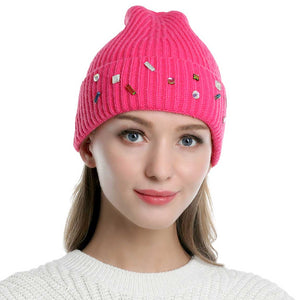 Pink Bling Stone Embellished Knit Beanie Hat, wear this beautiful beanie hat with any ensemble for the perfect finish before running out the door into the cool air. The hat is made in a unique style and it's richly warm and comfortable for winter and cold days. Perfect gift item for all occasions.