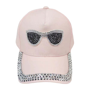 Pink Bling Sunglasses Accented Studded Baseball Cap, this stylish baseball cap is the perfect accessory for any casual outing. It looks so pretty, bright, and elegant in any season. The cap is adjustable, ensuring maximum comfort. Show your style with this perfect accessory. This cap is a fantastic gift for your loved one.