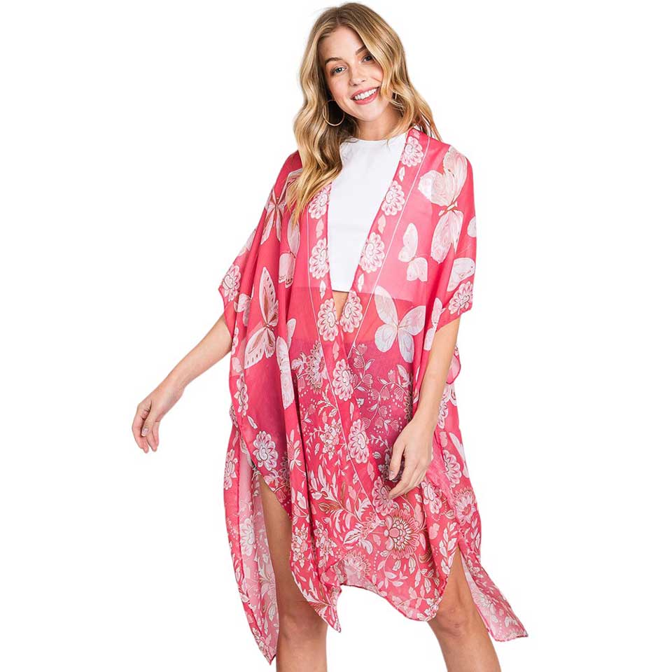 Pink Butterfly and Flower Print Kimono Poncho, is a stylish addition to any wardrobe or a perfect gift. Made from high-quality materials, it features a beautiful butterfly and flower print that adds a touch of elegance to any outfit. Its versatile design allows for effortless layering, making it perfect for any occasion.