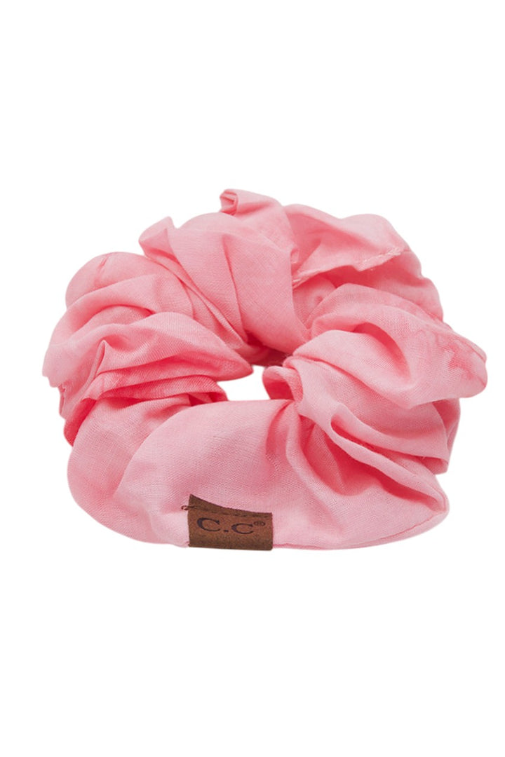 Pink C.C Tie Dye Scrunchies - the perfect accessory to add a pop of color to any outfit! Made with high-quality materials, these scrunchies are durable and stylish. With vibrant tie-dye designs, they are a must-have for any fashionista. Express your unique style and elevate your hair game with C.C Tie Dye Scrunchies.