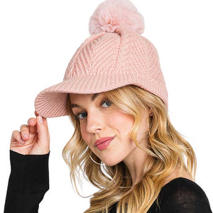 Pink Chevron Patterned Faux Fur Pom Pom Knit Cap will keep you warm and stylish in winter weather. Its faux fur pom pom and chevron patterned knit detail makes this cap the perfect mix of luxury and comfort. Wear it confidently and stay warm on cold days. Excellent gift choice for family members and friends on chilly days.