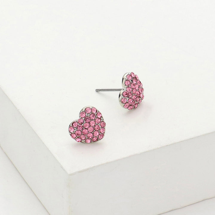 Pink-Crystal Stone Paved Heart Stud Earrings add a touch of sparkle to any outfit. Expertly crafted with crystal stones, they offer a timeless and elegant look. Perfect for any occasion, these earrings are a must-have for any jewelry collection.