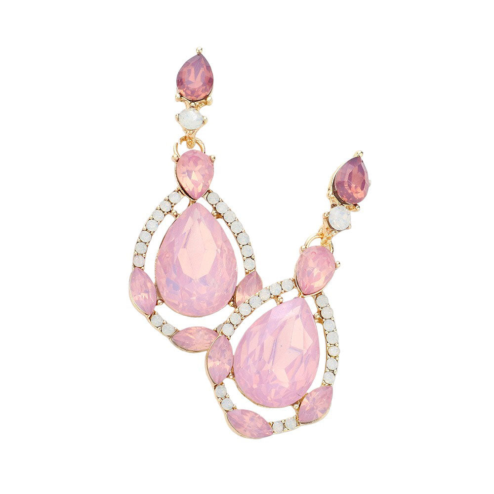 Pink Crystal Rhinestone Teardrop Evening Earrings, are beautifully crafted with glimmering crystal rhinestones and a teardrop design that adds elegance and charm to your look. They are the perfect accessory for adding a touch of glamour to any special occasion. A quintessential gift choice for loved ones on any special day.