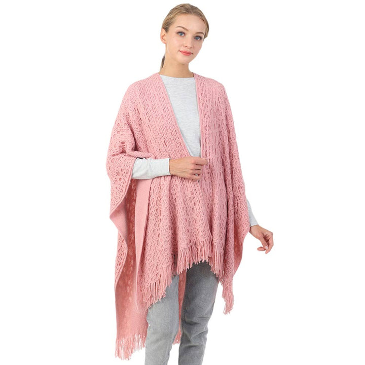 Pink Cut Out Detailed Fringe Poncho, with the latest trend in ladies' outfit cover-up! The high-quality knit poncho is soft, comfortable, and warm but lightweight. It's perfect for your daily, casual, party, evening, vacation, and other special events outfits. A fantastic gift for your friends or family.