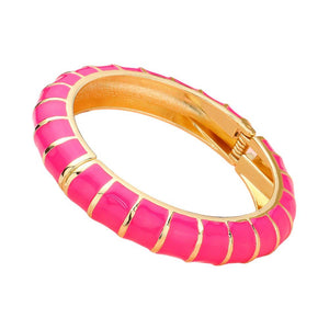 Pink Enamel Bamboo Hinged Bangle Bracelet, Discover the beauty and elegance of our bracelets that combine the durability of bamboo with the vibrant pop of enamel. Made for everyday wear, the bangle is both stylish and practical, with a hinged design for easy on and off. Add a touch of sophistication to your wardrobe.