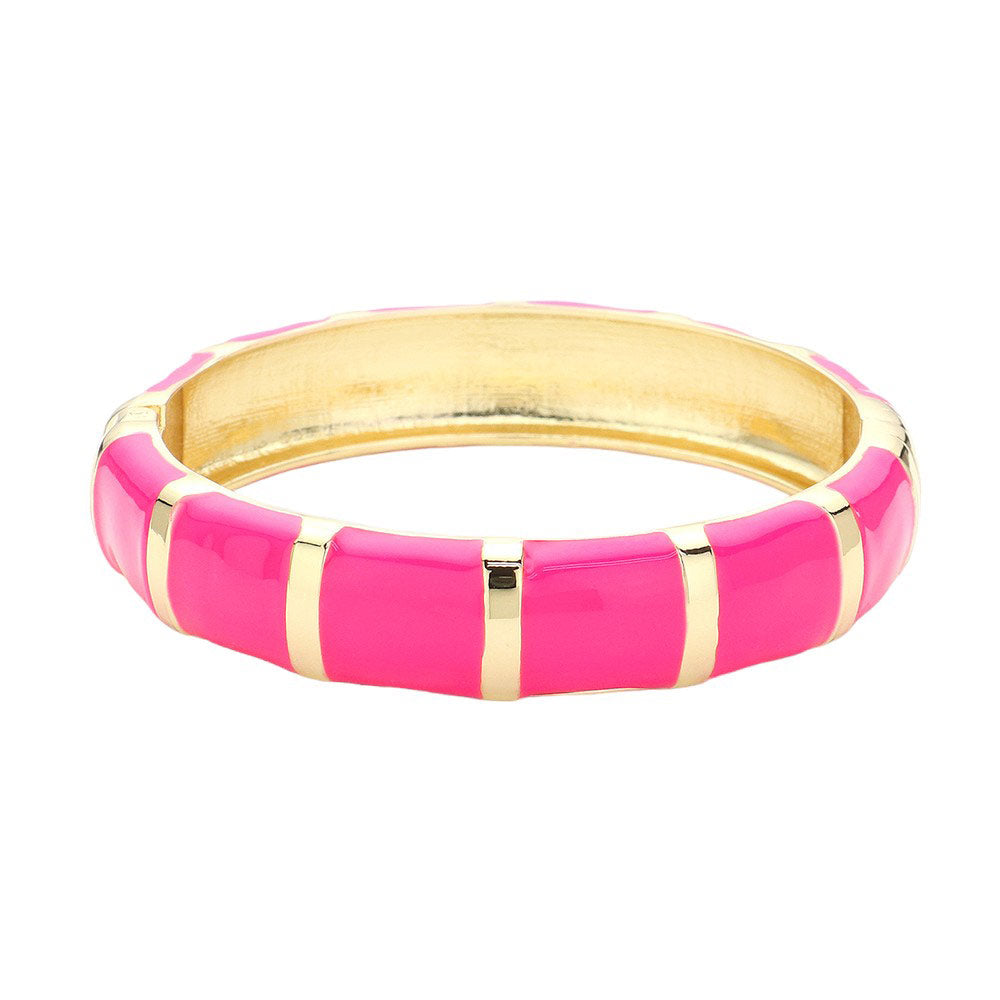 Pink Enamel Bamboo Hinged Bangle Bracelet, Discover the beauty and elegance of our bracelets that combine the durability of bamboo with the vibrant pop of enamel. Made for everyday wear, the bangle is both stylish and practical, with a hinged design for easy on and off. Add a touch of sophistication to your wardrobe.