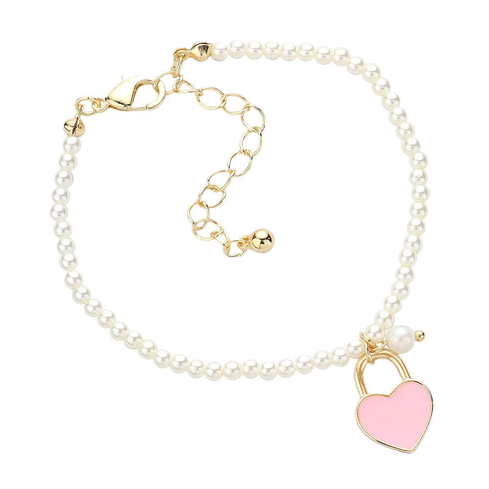 Pink Enamel Heart Charm Pendant Pearl Bracelet, is a stunning accessory that adds a touch of elegance to any outfit. The enamel heart charm brings a playful yet sophisticated element, while the pearl bracelet exudes timeless beauty. Perfect for any occasion, this bracelet is a must-have for those seeking a stylish look.