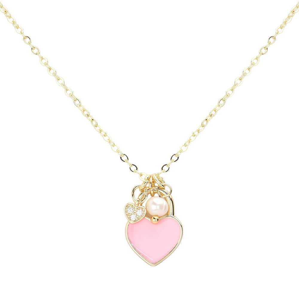 Pink Enamel Heart Pearl Pendant Necklace, is a stunning addition to any jewelry collection. With its delicate heart-shaped pendant and lustrous pearl, this necklace adds a touch of elegance to any outfit. Handcrafted with high-quality enamel and a pearl, this necklace is a timeless piece that is sure to impress.