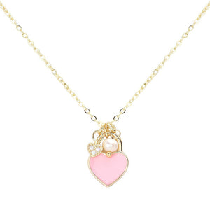 Pink Enamel Heart Pearl Pendant Necklace, is a stunning addition to any jewelry collection. With its delicate heart-shaped pendant and lustrous pearl, this necklace adds a touch of elegance to any outfit. Handcrafted with high-quality enamel and a pearl, this necklace is a timeless piece that is sure to impress.