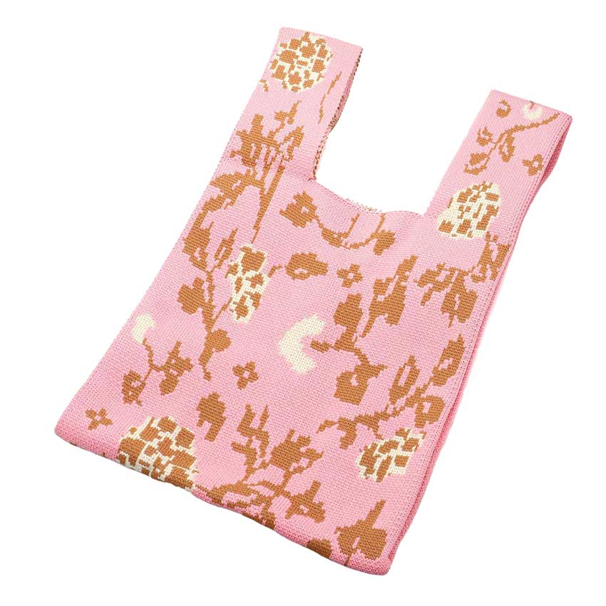 Pink Floral Knit Tote Bag, is the perfect accessory for all your shopping needs. It is made from knit fabric and designed with a floral pattern. The bag is lightweight, making it easy to carry and store books, groceries, and more. Its stylish and timeless look makes it a perfect gift, this tote bag will make you noticeable.