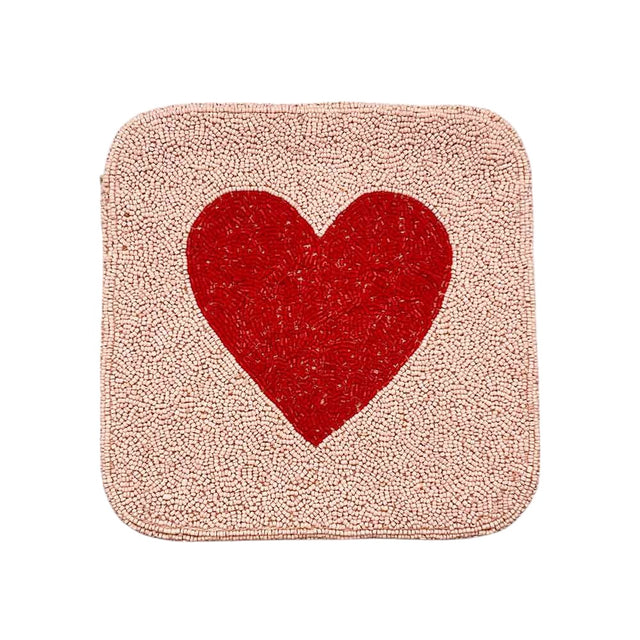 Pink Heart accented crossbody bag is adorned with delicate seed beads, adding a touch of elegance to any outfit. The compact square shape is perfect for carrying your essentials, while the crossbody strap keeps your hands free. The unique design and quality materials make it a must-have accessory for any fashion-forward individual.