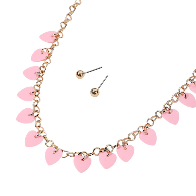 Pink-Heart Sequin Station Jewelry Set is the perfect accessory for any outfit. Crafted with precision and featuring delicate heart-shaped sequins, this necklace is both elegant and fun. Add a touch of sparkle and charm to your ensemble with this eye-catching necklace.