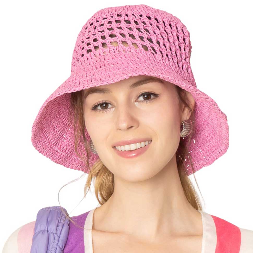 Pink Open Weave Solid Straw Bucket Hat - the perfect accessory for sunny days! Made with an open weave design, this hat keeps you cool while shielding you from the sun. Plus, the solid color adds a touch of sophistication to any outfit. Stay stylish and protected with our bucket hat!
