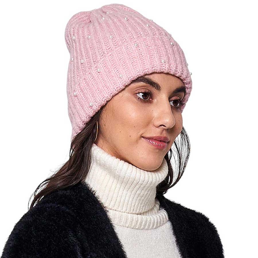 Pink Knitted Pearl Beanie Hat, Stay warm in perfect style. This beanie is knitted with lightweight wool and features delicate pearl detailing for an effortless chic look. The lightweight wool helps to keep in warmth and is sure to be durable, keeping you warm for years to come. Nice and thoughtful gift idea in Cold Ace.