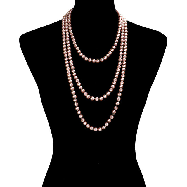 Pink Pearl Long Necklace, is the perfect marriage between timeless elegance and modern style. Handcrafted with pearls, this exquisite necklace is sure to become a staple in any jewelry wardrobe. Its contemporary design and luxurious materials make it a perfect choice for any occasion. Perfect occasional gift idea.
