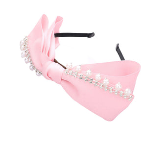 Pink Pearl Stone Embellished Bow Headband, the combination of stone sewn on an oversized headband will make you feel glamorous. Be ready to receive compliments. Be the ultimate trendsetter wearing this chic headband with all your stylish outfits! These are beautifully designed on a bow and pearl theme to put on a pop of color and complete your ensemble.