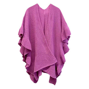 Pink This Reversible Ruffle Sleeves Knit Ruana Poncho adds the perfect touch of sophistication to your look. Crafted from 100% Polyester this poncho features reversible sleeves with a unique ruffle design.  Easy to wear and care for, it's a must-have for any wardrobe. Excellent choice as a gift item for your loved ones. 