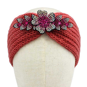 Pink Rhinestone Flower Bling Pointed Knit Earmuff Headband, features a crystal-shaped pattern that adds a touch of sparkle to your winter look. The soft knit fabric ensures a comfortable fit, while the pointed shape keeps your ears warm in cold weather. Perfect for gifting or adding glamour to any winter ensemble.