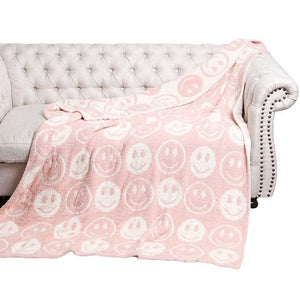 Pink Smile Patterned Reversible Throw Blanket, this ultra-soft throw provides warmth and comfort to any living space. It's made from high-quality materials and features a reversible design featuring a fun, cheerful smile pattern that adds a touch of personality to your home. Perfect winter gift for family and friends.