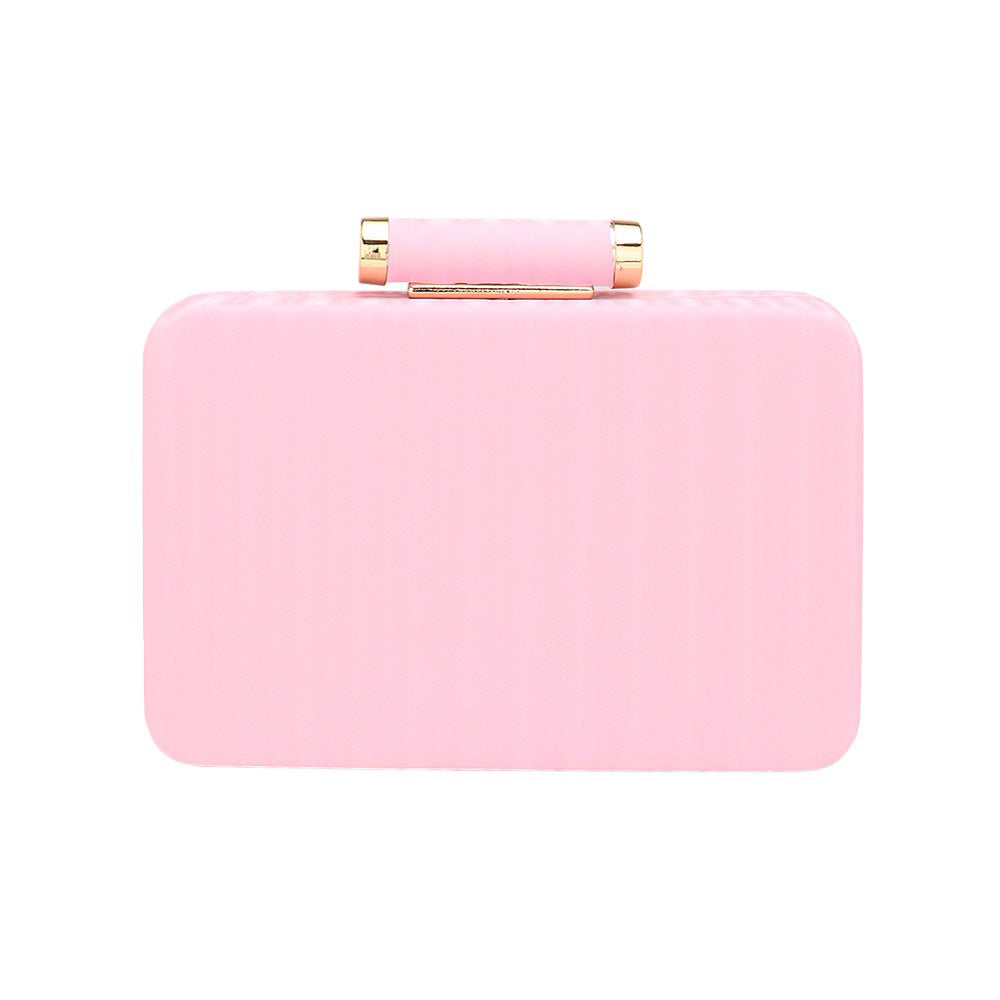 Pink Solid Embossed Clutch Crossbody Bag for those who appreciate chic and versatile accessories. Made with high-quality materials and featuring a beautiful embossed design, this bag is perfect for both formal and casual occasions. Wear it as a clutch or use the detachable strap for a hands-free crossbody look.