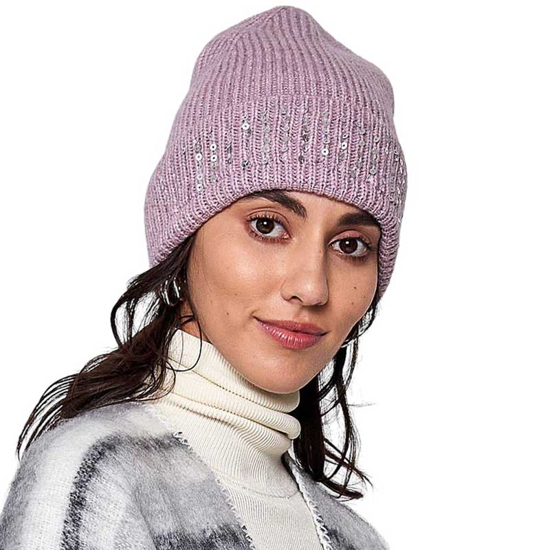 Pink Solid Ribbed Sequin Cuff Beanie Hat, is perfect for staying warm and stylish in cold weather. Its ribbed knit construction and sequin cuff add structure and texture, while providing warmth and comfort. It is lightweight and easy to pack, making it an ideal accessory for any cold-weather excursion or an exquisite gift.