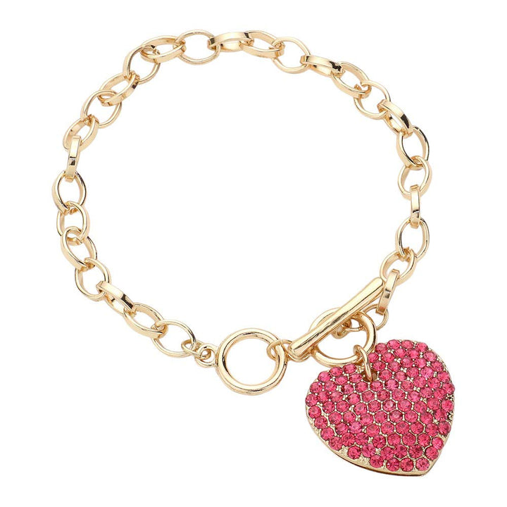 Pink Stone Paved Heart Pendant Metal Toggle Bracelet, is a must-have accessory for any fashion-forward individual. Exquisitely crafted to elevate any outfit, this bracelet is a unique addition to your jewelry collection. Its toggle closure ensures a secure fit and its elegant style will make you stand out from the crowd.