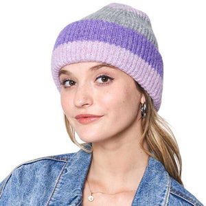 Pink Striped Ribbed Beanie Hat, Stay warm and stylish this winter. Crafted from a blend of cotton, this hat features a ribbed knit design and striking stripes to make a bold statement while keeping your head cozy. The perfect accessory for all your cold-weather activities!