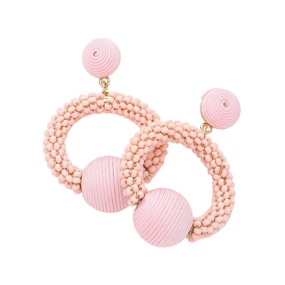 Pink Thread Wrapped Ball Accented Seed Beaded Open Circle Dangle Earrings, Get in the loop with these playful earrings! The unique thread wrapped design and dangling open circles make for a quirky, fun addition to any outfit. Don't miss out on this trendy accessory (pun intended)!