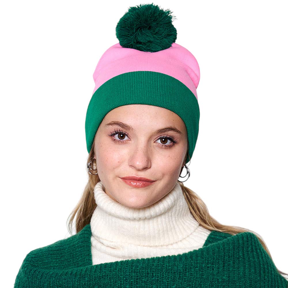 Pink & Green Color Block Ribbed Pom Pom Beanie Hat, Stay warm in style. It features a unique color block design with a ribbed knit, and a pom pom on top for added character. The perfect combination of fashion and function, this hat will keep you both warm and looking your best. Ideal gift item for any winter occasion.