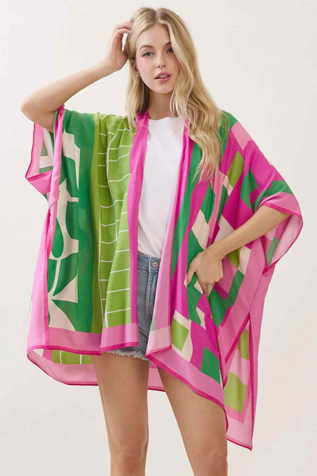 Pink Green Effortless elegance meets versatile style with this geometric pattern mixed print kimono cover up. Crafted from 100% viscose, the lightweight fabric drapes beautifully over swimwear, dresses, or casual outfits, making it perfect for beach days, resort wear, or layering year-round. The eye-catching geometric and mixed print design adds visual interest to any ensemble. Measuring 40" x 60", it offers generous coverage and comfortable movement. An essential piece for anyone seeking laid-back sophisti