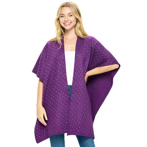 Purple Bling Solid Ruana Poncho, Crafted from soft fabric, this poncho features a luxurious sparkle for a touch of glamour. With a ruana-style cut, the poncho is designed for maximum comfort and added coverage. Perfect for cooler days, it will quickly become a wardrobe staple. Give the perfect gift with this poncho.