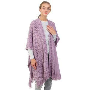 Purple Cut Out Detailed Fringe Poncho, with the latest trend in ladies' outfit cover-up! The high-quality knit poncho is soft, comfortable, and warm but lightweight. It's perfect for your daily, casual, party, evening, vacation, and other special events outfits. A fantastic gift for your friends or family.