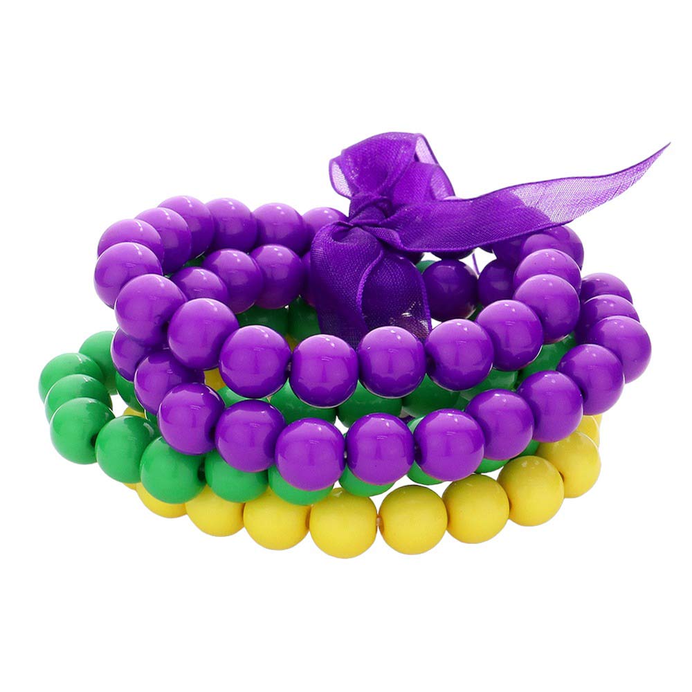 Purple Multi 5PCS Mardi Gras Ball Beaded Stretch Bracelets, will complete your look. Crafted with beautiful, bright beads these bracelets feature an array of colors and shapes for a fun and festive accent to your style. The stretchy design ensures a comfortable fit. Enjoy the fun and festive vibes of Mardi Gras all year round!