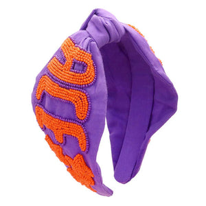 Purple Orange Get ready for the game with this Game Day Seed Beaded ACE Message Star Knot Burnout Headband. Crafted with soft material and adorned with seed beading, an ACE message, and a star knot, this headband is perfect for making a statement and staying comfortable at the same time. Cheer up your favorite team with this.