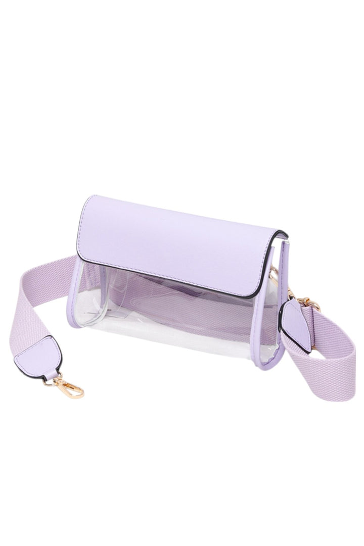 Solid Trim Clear Stadium Crossbody Bag combines transparency with reinforced solid trim for enhanced durability and style. Designed to meet stadium security requirements, it offers easy visibility of contents while maintaining a sleek, structured look. Its crossbody design ensures comfortable, hands-free wear, making it a practical choice for events where convenience and compliance are essential.