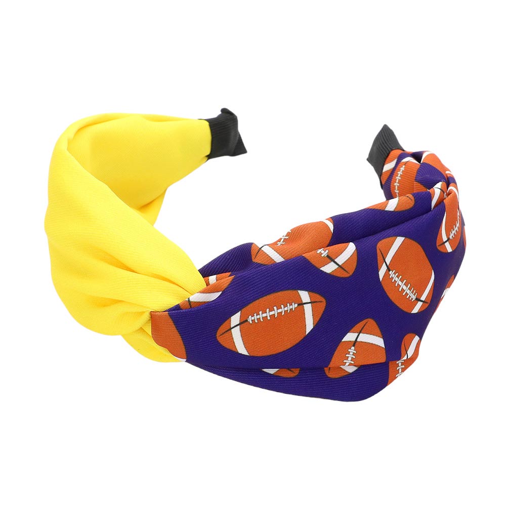 Purple Yellow Game Day Football Patterned Twisted Headband, Stay stylish and comfy with this Headband. This headband is designed with a soft fabric material for comfort and is patterned with an eye-catching football design for a game-day-ready look. Attend your team's play with this  Football Patterned Twisted Headband. 