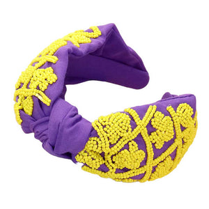Purple Yelloe Be ready for game day with this stylish and comfortable Game Day Seed Beaded Paw Knot Burnout Headband. This headband is made from lightweight polyester and features a burnout design of paw knots with seed beads. Perfect for everyday wear, it's sure to make a statement and show your team spirit. 