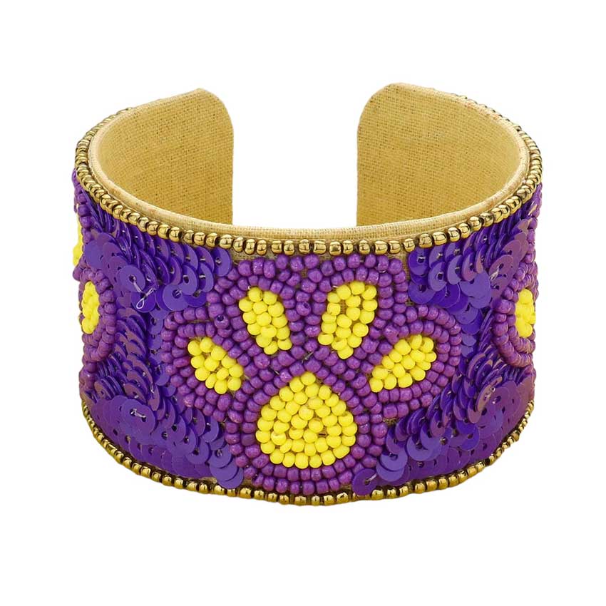 Purple Yellow This stylish Game Day Sequin Seed Beaded Paw Accented Cuff Bracelet is the perfect way to show your team spirit. Crafted with sparkling sequins and beads, this bracelet features an eye-catching paw accent, perfect for any sports fan. Show your true allegiance on game day with this fashionable and unique accessory.