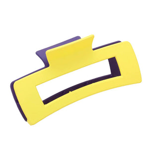 Purple Game Day Two Tone Open Rectangle Hair Claw Clip, is perfect for keeping your locks in place. This professional-grade clip features a firm grip clamp that ensures your hair stays put all day long. Made from high-quality materials, this clip is sure to last. Perfect gift for sports lovers to show their team spirit.