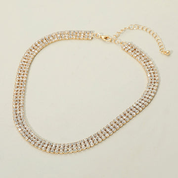 Madeline Love Clear, Gold Gold Dipped Triple Row Rhinestone Necklace - Necklaces