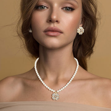 Madeline Love Cream, Gold Rhinestone Paved Clover Pendant Pearl Necklace - Necklaces
