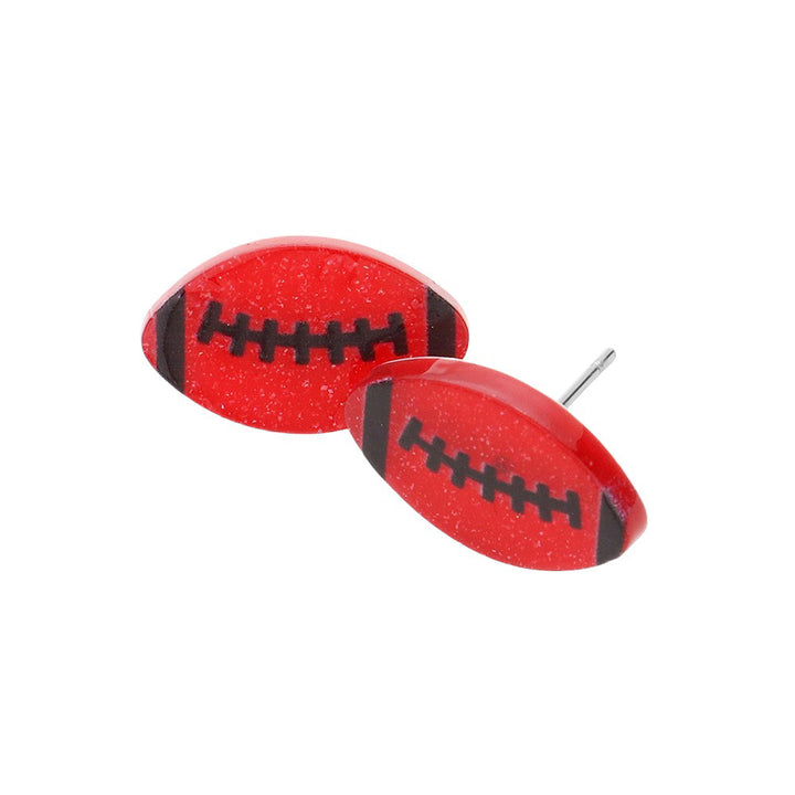 Red Black Football Game Day Resin Stud Earrings, Show your football team spirit with these fashionable earrings. Featuring resin material with a football shape, these earrings give you a fashionable way to show off your loyalty to your favorite team. With a lightweight design, they're sure to be a fan favorite.