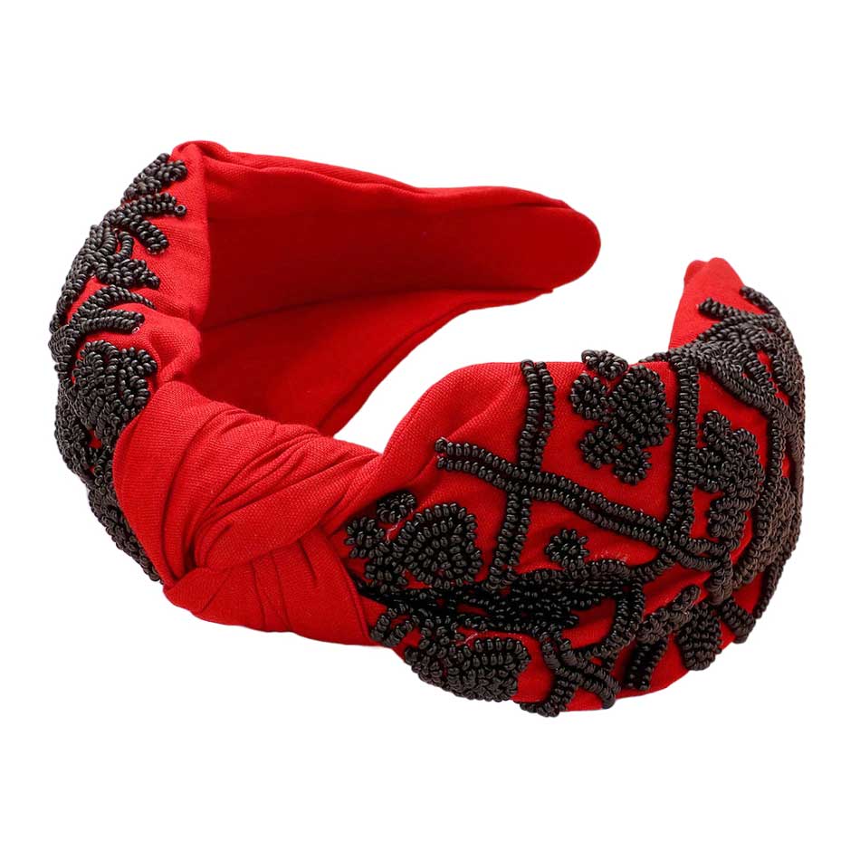 red Black Be ready for game day with this stylish and comfortable Game Day Seed Beaded Paw Knot Burnout Headband. This headband is made from lightweight polyester and features a burnout design of paw knots with seed beads. Perfect for everyday wear, it's sure to make a statement and show your team spirit. 