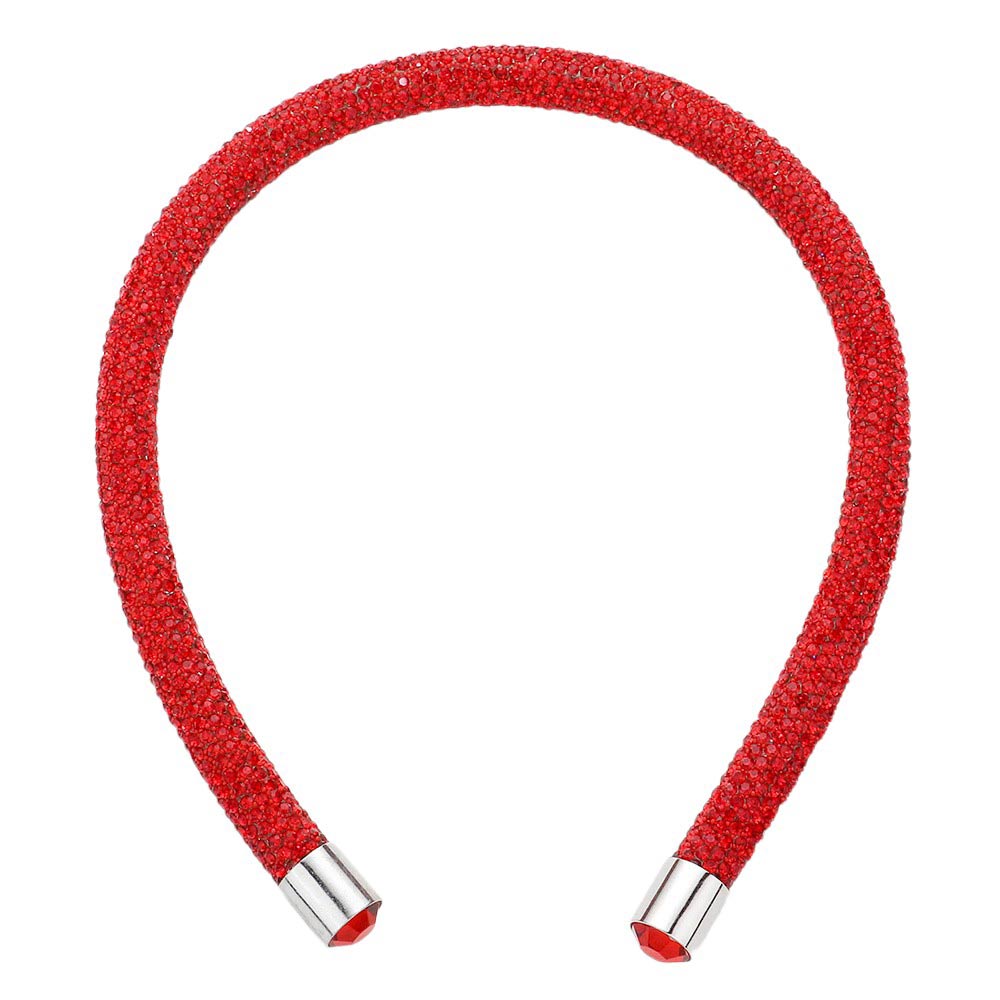 Red Bling Headband. This stylish accessory is crafted with dazzling jewels and adds a touch of elegance to any outfit. Perfect for special occasions and everyday wear, the Bling Headband is sure to make a statement. Enhance your look with this must-have accessory.