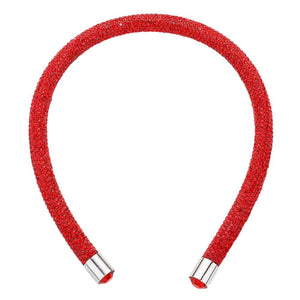 Red Bling Headband. This stylish accessory is crafted with dazzling jewels and adds a touch of elegance to any outfit. Perfect for special occasions and everyday wear, the Bling Headband is sure to make a statement. Enhance your look with this must-have accessory.