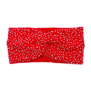 Red Bling Knot Earmuff Headband, is designed to keep you warm and stylish. Crafted from a comfortable material blend, this headband is lightweight and offers superior insulation against cold temperatures. The eye-catching knot bling detail adds a touch of style to any winter outfit. Perfect winter gift idea.