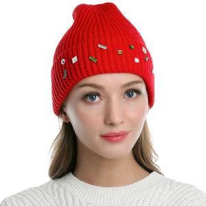 Red Bling Stone Embellished Knit Beanie Hat, wear this beautiful beanie hat with any ensemble for the perfect finish before running out the door into the cool air. The hat is made in a unique style and it's richly warm and comfortable for winter and cold days. Perfect gift item for all occasions.